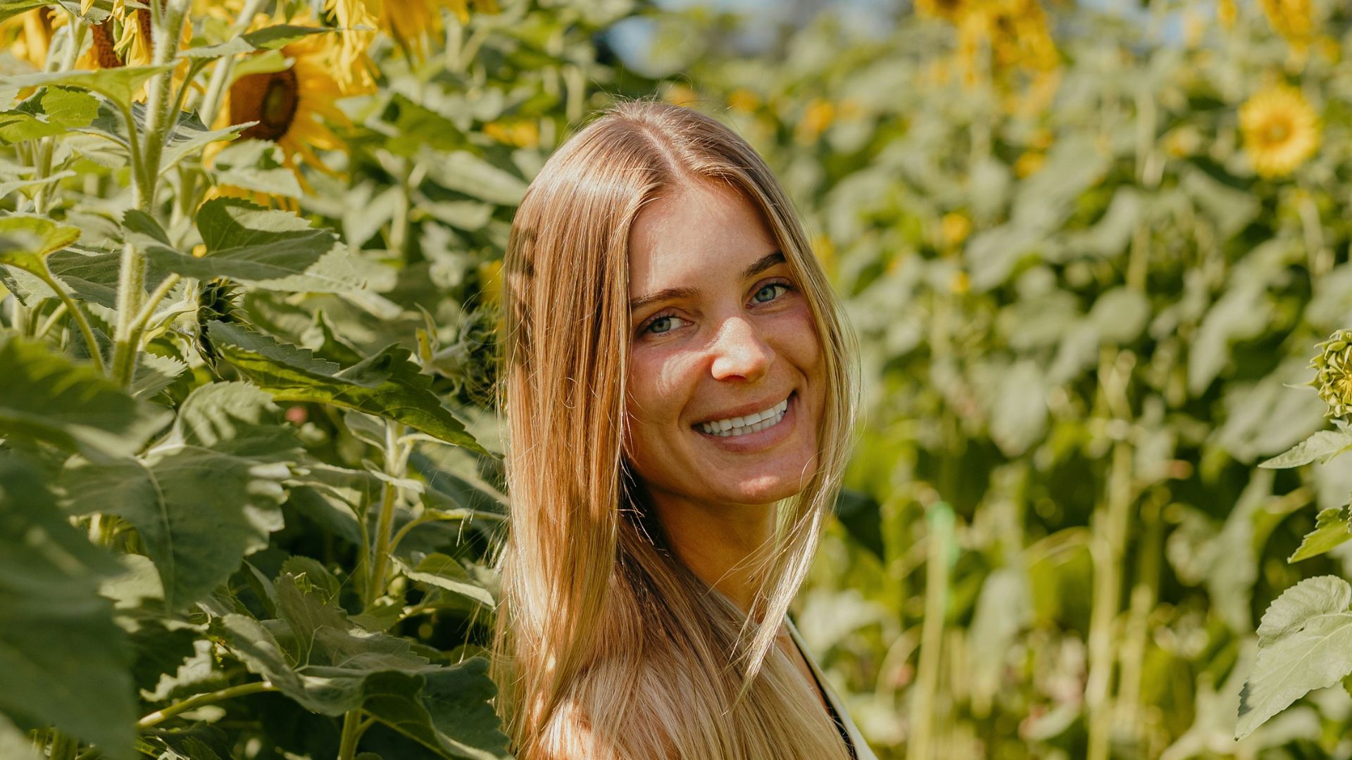 Reversing Leptin Resistance: What To Know + How To Heal Woman Smiling