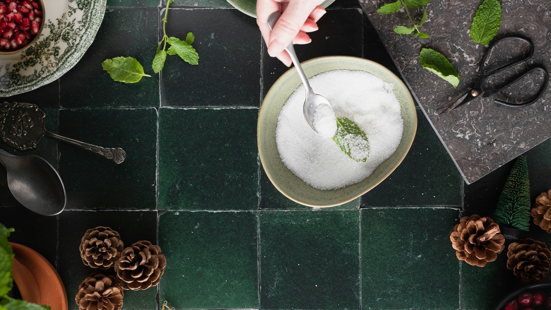 Bowl Of Sugar And Mint With A Spoon In It