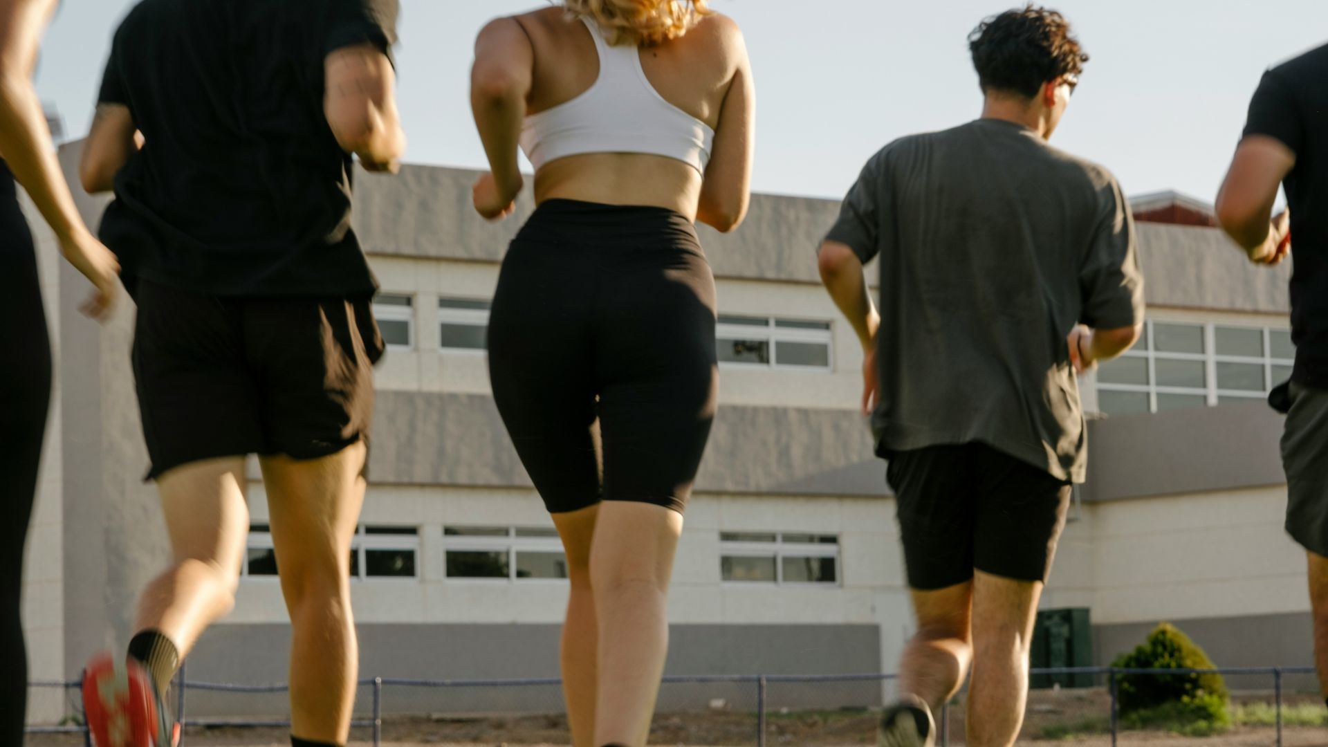 Group Of People Jogging On A Sunny Day