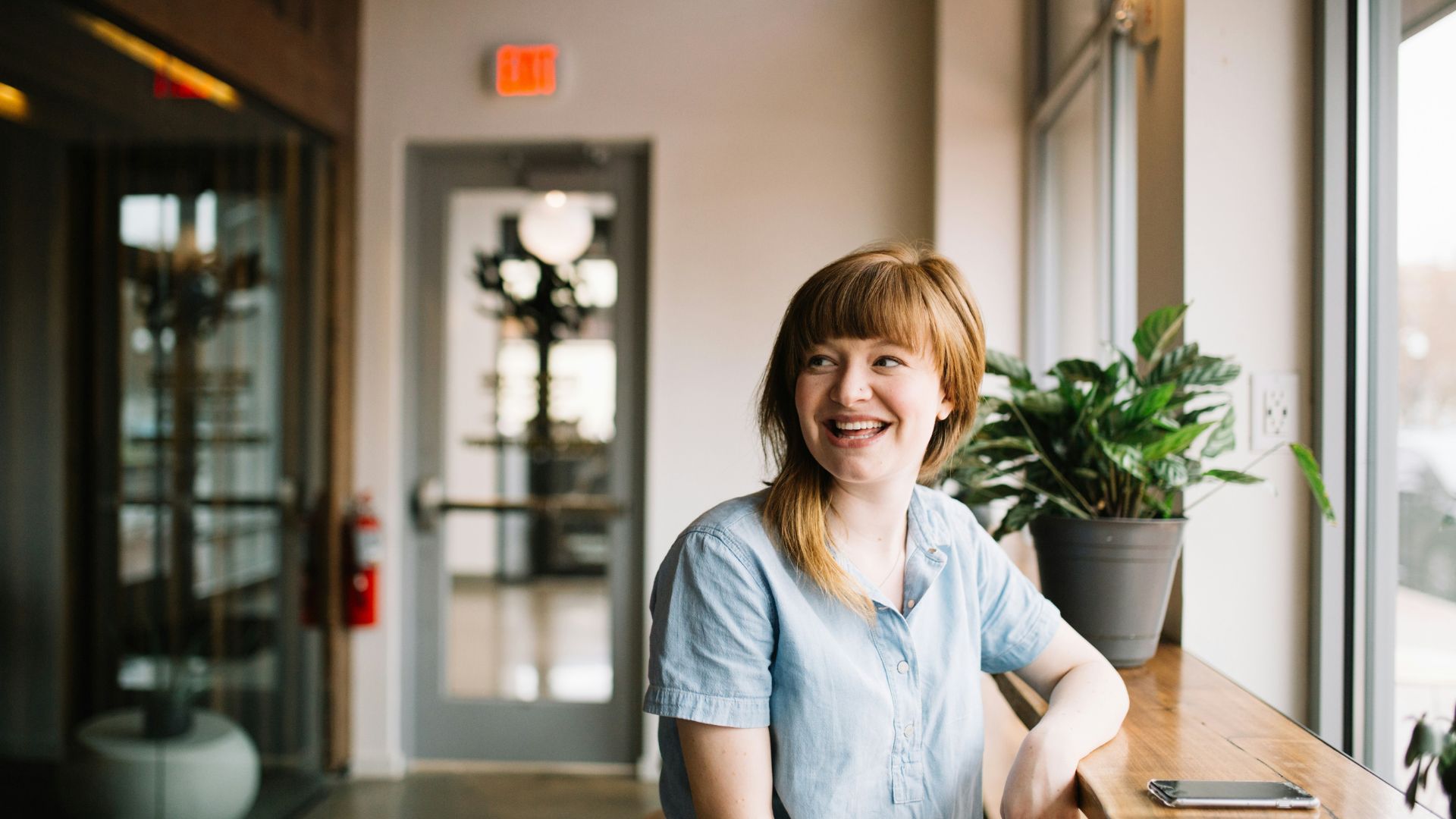 Smiling Woman In Coffee Shop