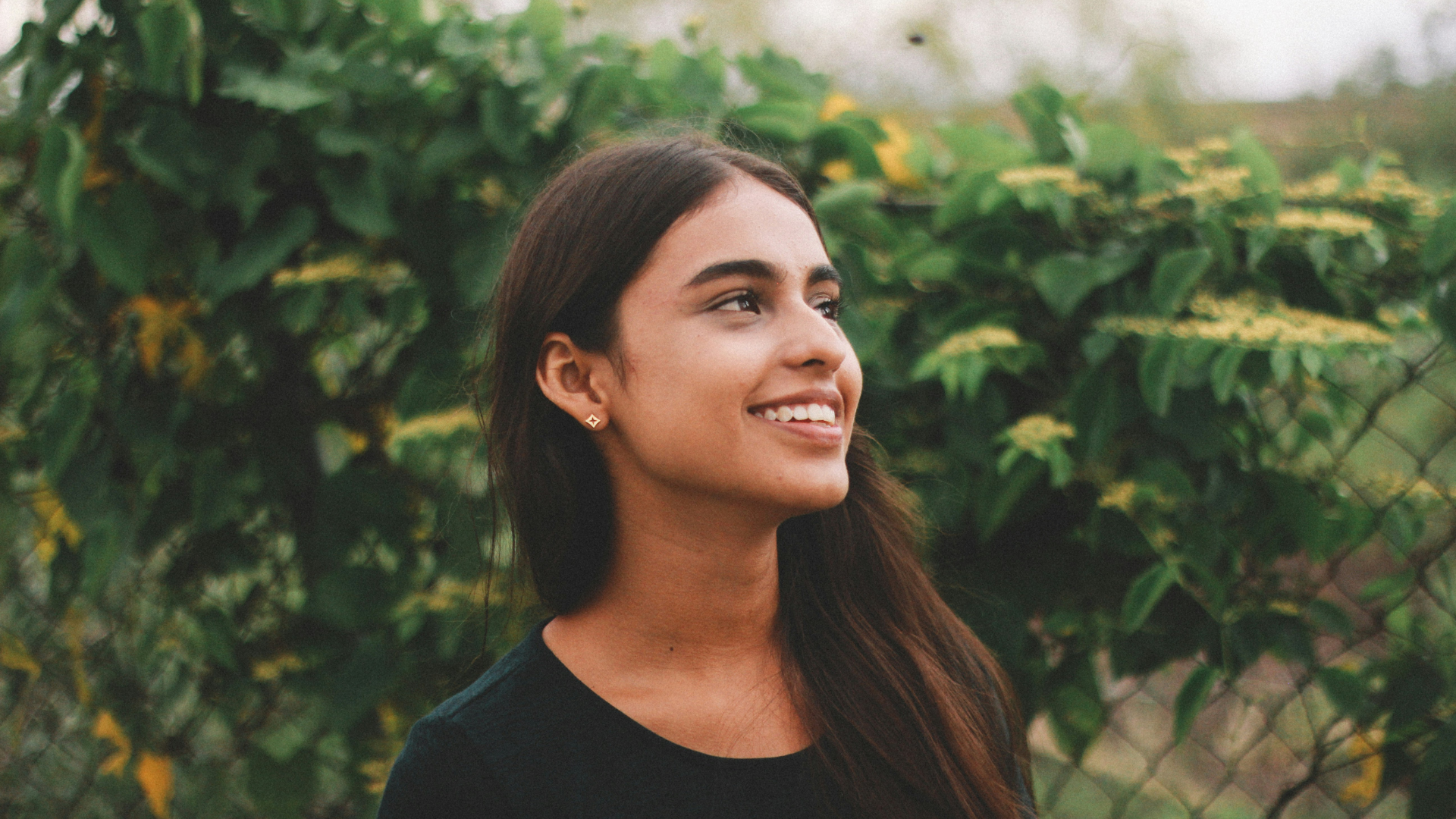 Marshmallow Root Benefits For Gut Woman Outside Smiling