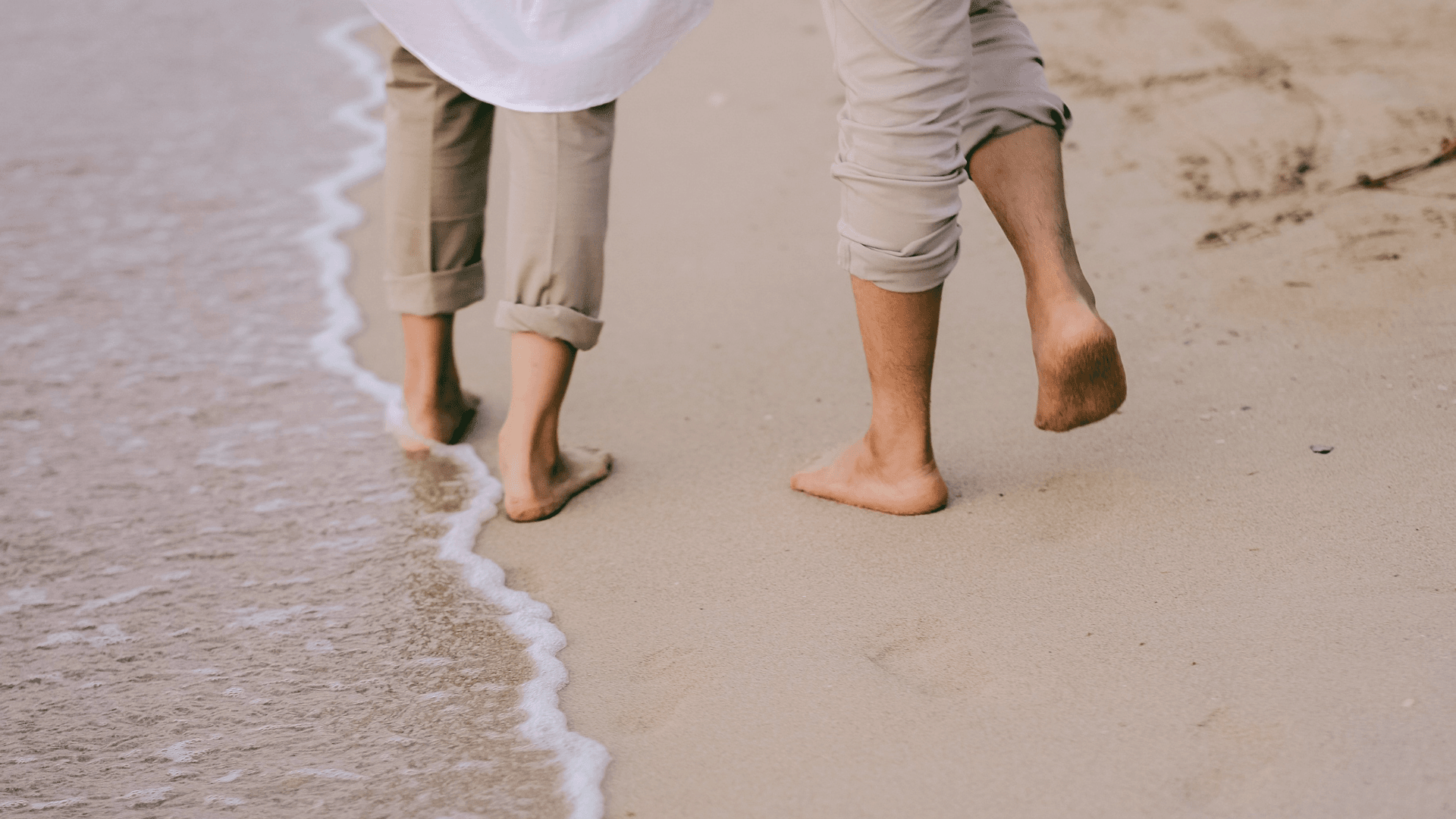 People Walking On The Beach