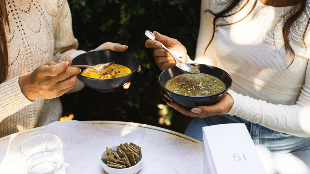 Two People Eating Prolon Soup