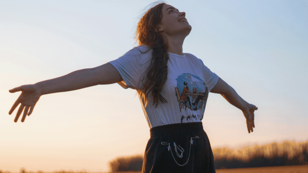Woman With Arms Open Outside