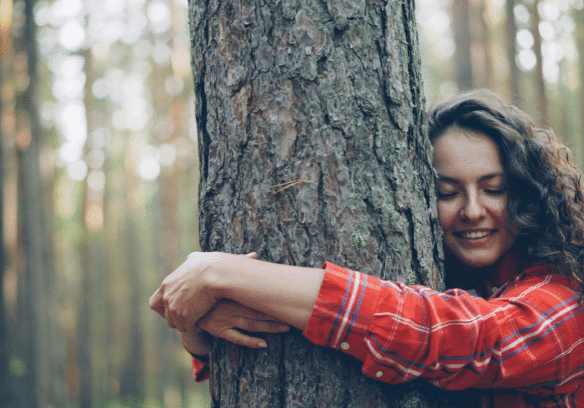 Woman Hugging Tree