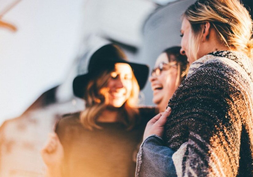 Three Women Outside Laughing