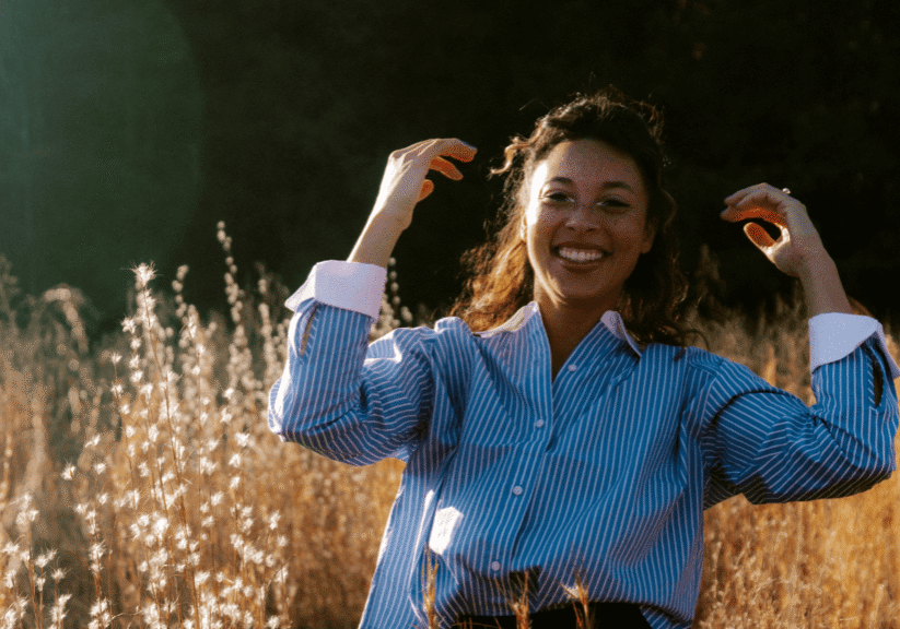 Woman Laughing In Field