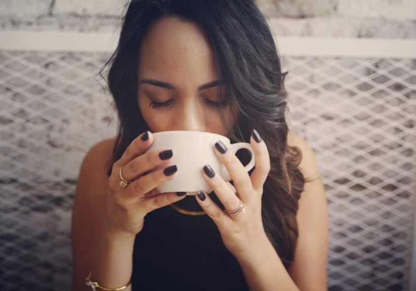 Woman Drinking From White Coffee Cup