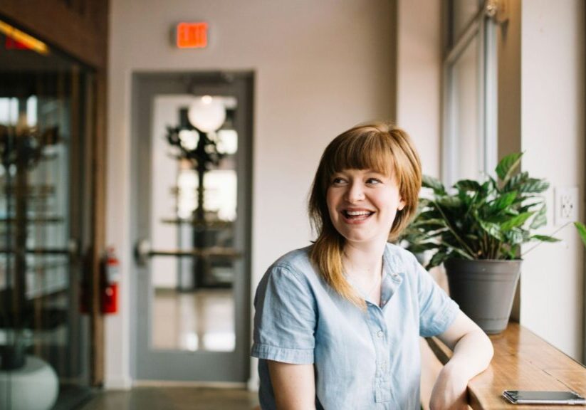 Smiling Woman In Coffee Shop