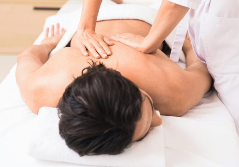 Person Getting A Back Massage